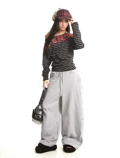 Striped Oblique Shoulder Long-sleeved T-shirt UNC0279