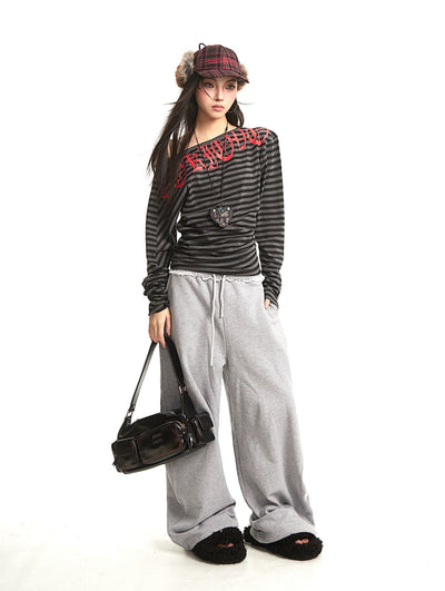 Striped Oblique Shoulder Long-sleeved T-shirt UNC0279