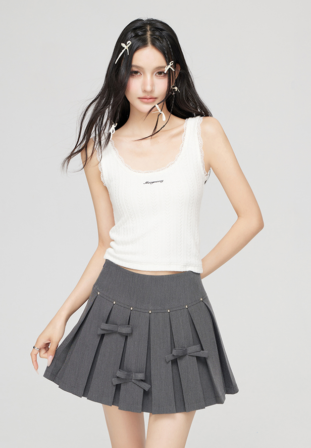 Pleated mini skirt with small bows MAC0047