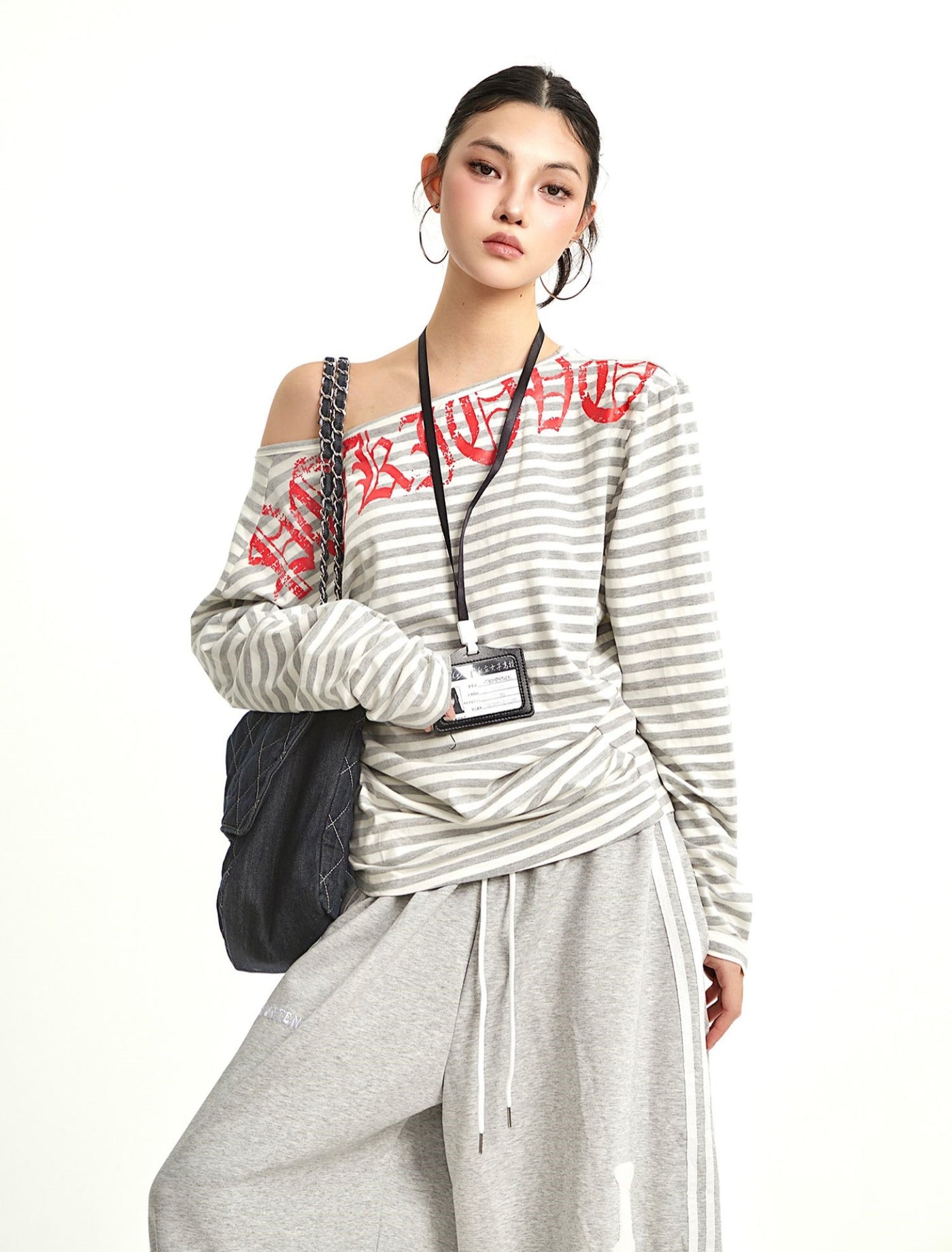 Striped Oblique Shoulder Long-sleeved T-shirt UNC0279