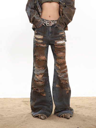 Damaged and stained flared wide denim pants UNC0114